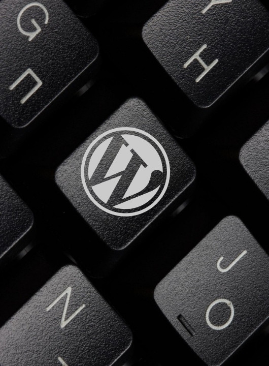 http://WordPress%20logo%20on%20keyboard%20representing%20WordPress%20and%20WooCommerce%20development%20expertise